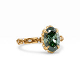 Fancy green oval lab-grown diamond engagement ring with vintage leaf-and-vine band