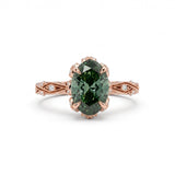 Fancy green oval lab-grown diamond engagement ring with vintage leaf-and-vine band