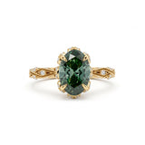 Fancy green oval lab-grown diamond engagement ring with vintage leaf-and-vine band