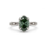 Fancy green oval lab-grown diamond engagement ring with vintage leaf-and-vine band