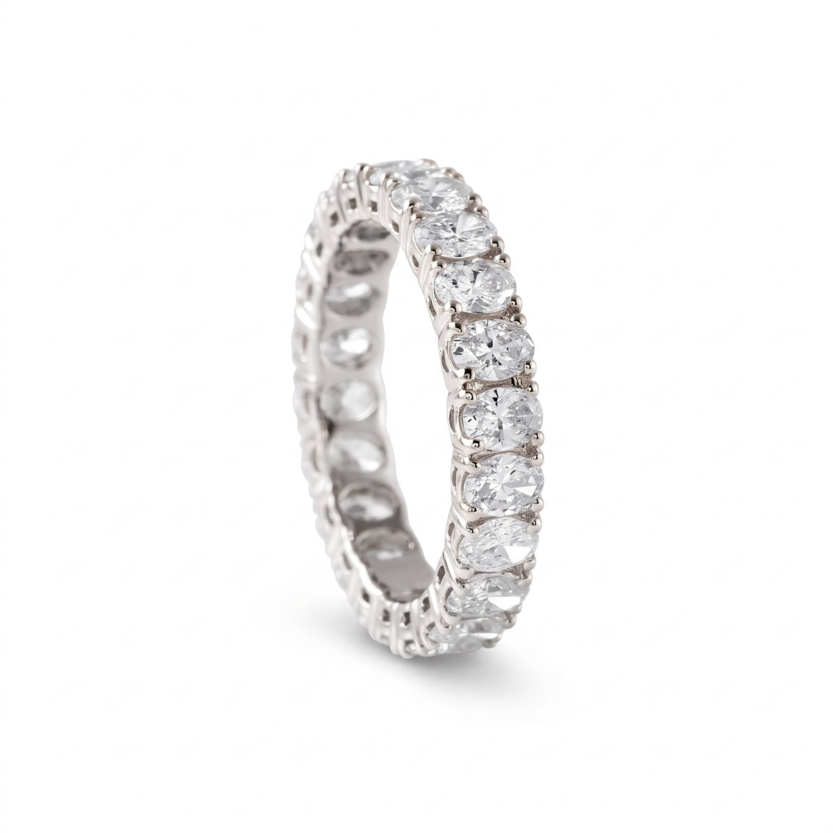 Oval cut moissanite full eternity wedding band in white gold with prong set stones