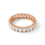 Oval cut moissanite full eternity wedding band in white gold with prong set stones