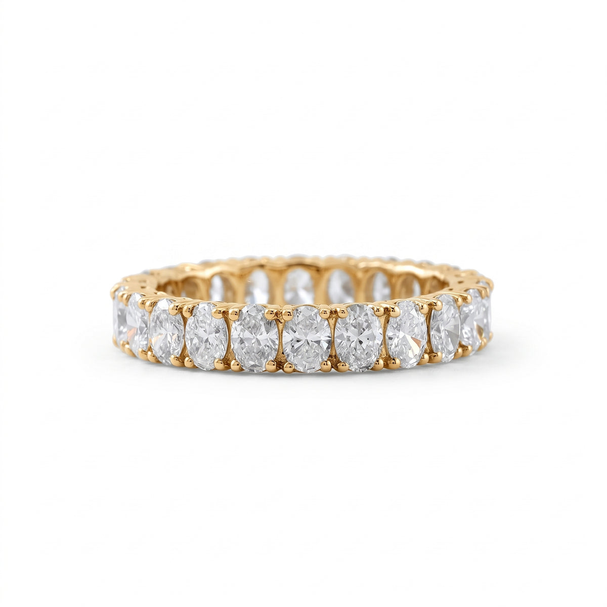 Oval cut moissanite full eternity wedding band in white gold with prong set stones