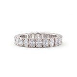 Oval cut moissanite full eternity wedding band in white gold with prong set stones
