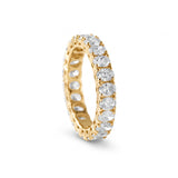 Oval cut moissanite full eternity wedding band in white gold with prong set stones