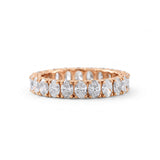 Oval cut moissanite full eternity wedding band in white gold with prong set stones