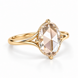 Oval rose-cut lab-grown diamond solitaire engagement ring with a four-prong compass setting and sculpted white-metal band