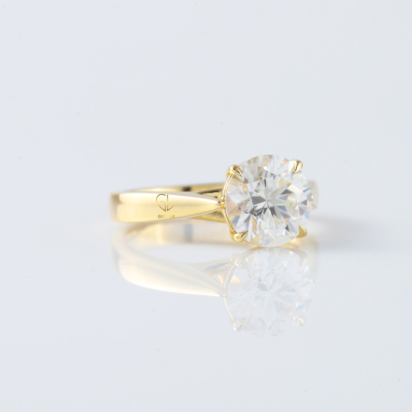 Pinch Style Round Moissanite Solitaire Engagement Ring