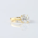 Pinch Style Round Moissanite Solitaire Engagement Ring