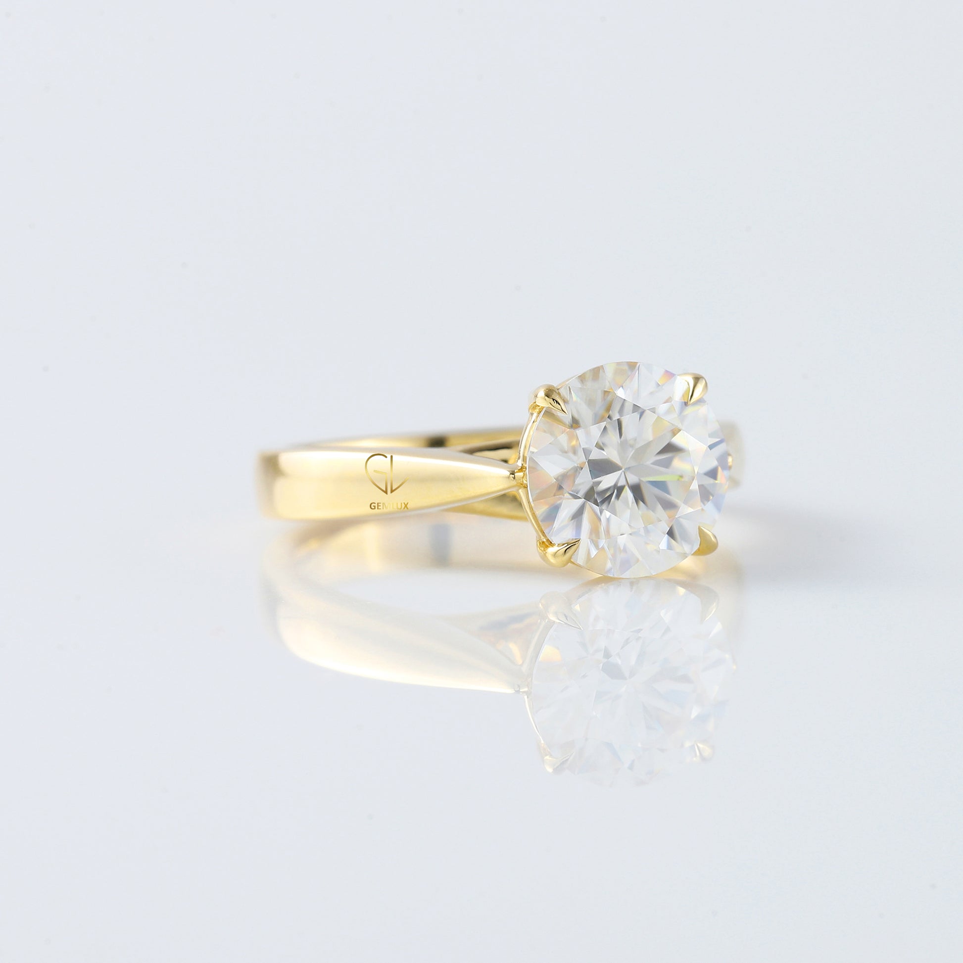 Pinch Style Round Moissanite Solitaire Engagement Ring