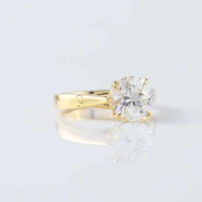 Pinch Style Round Moissanite Solitaire Engagement Ring
