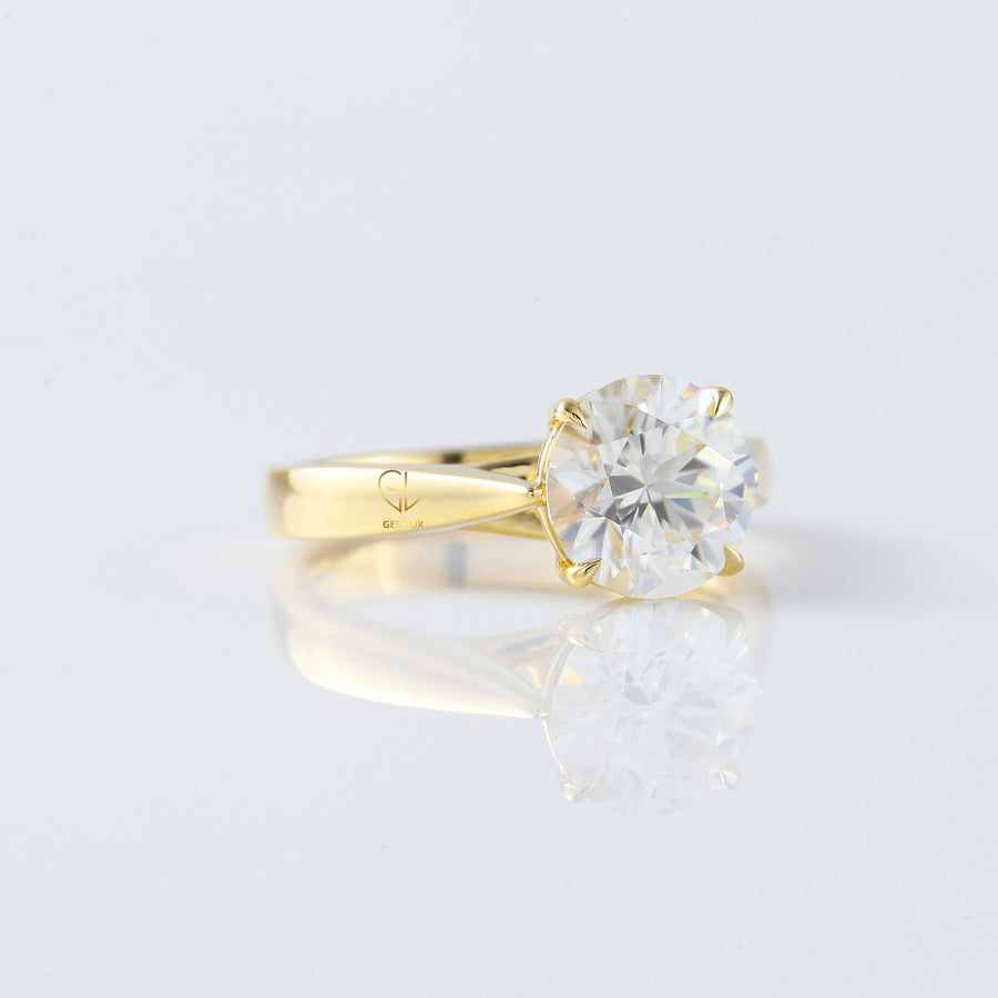 Pinch Style Round Moissanite Solitaire Engagement Ring