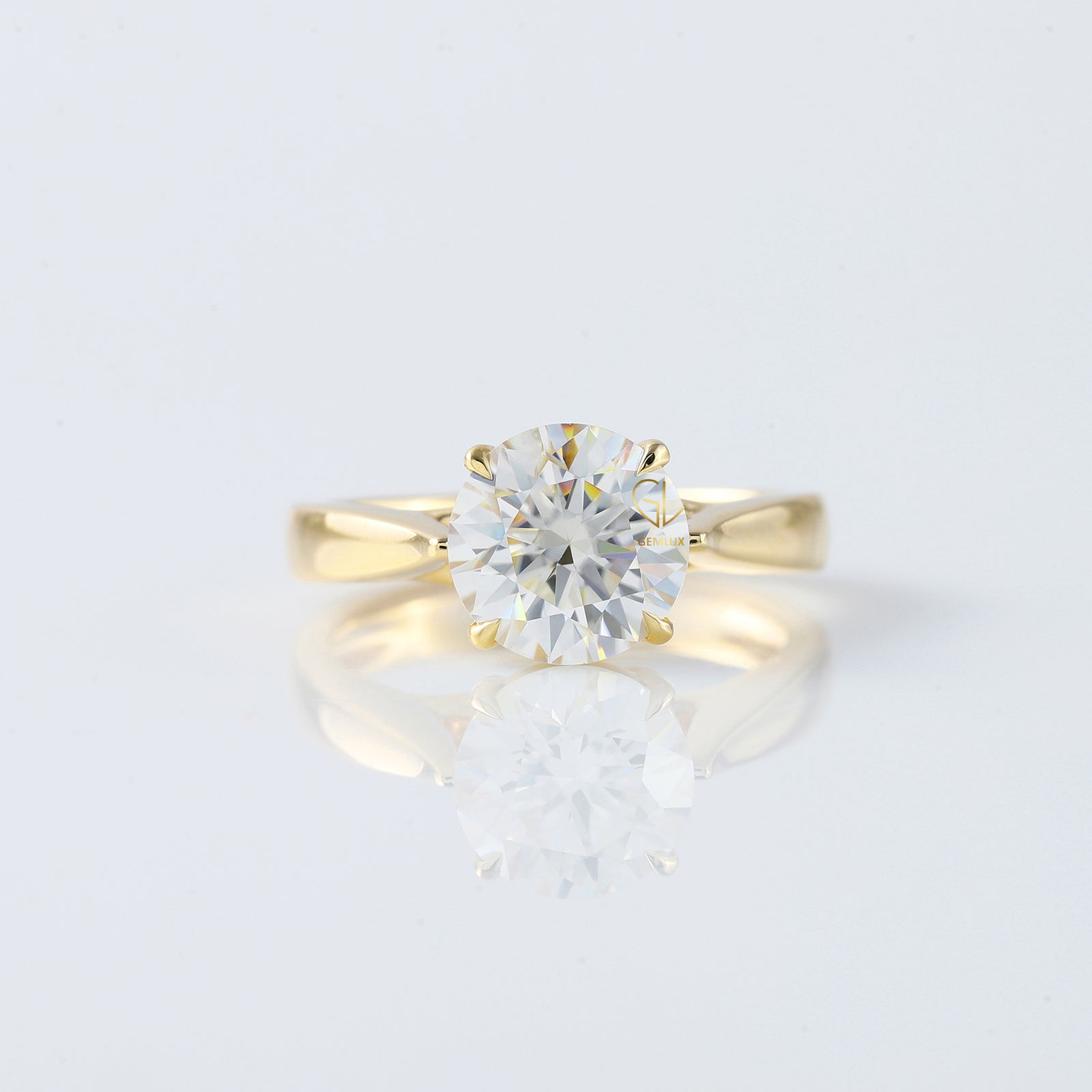 Pinch Style Round Moissanite Solitaire Engagement Ring
