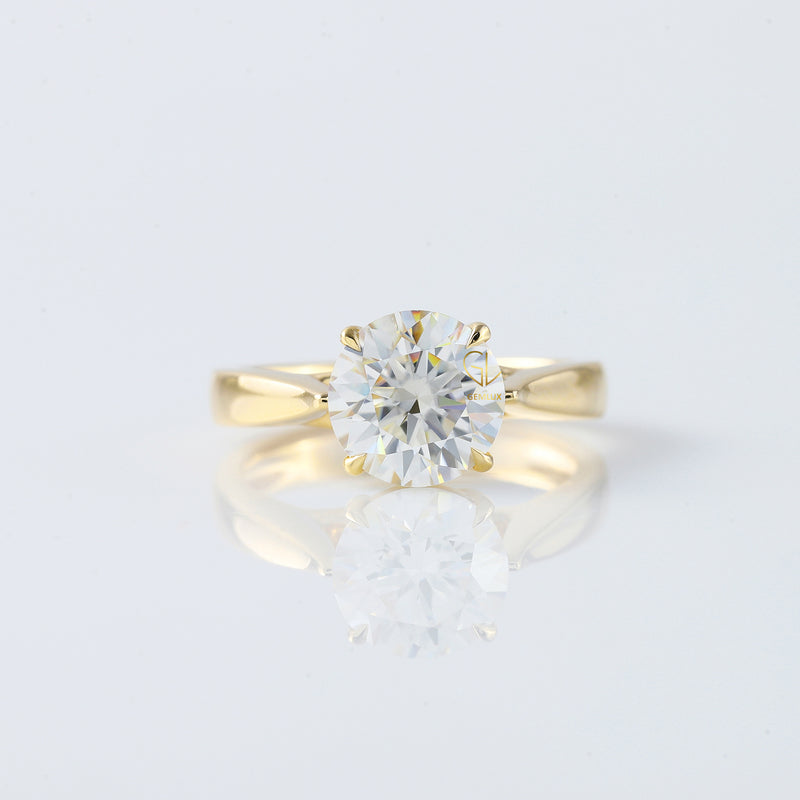 Pinch Style Round Moissanite Solitaire Engagement Ring