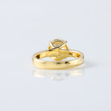 Pinch Style Round Moissanite Solitaire Engagement Ring
