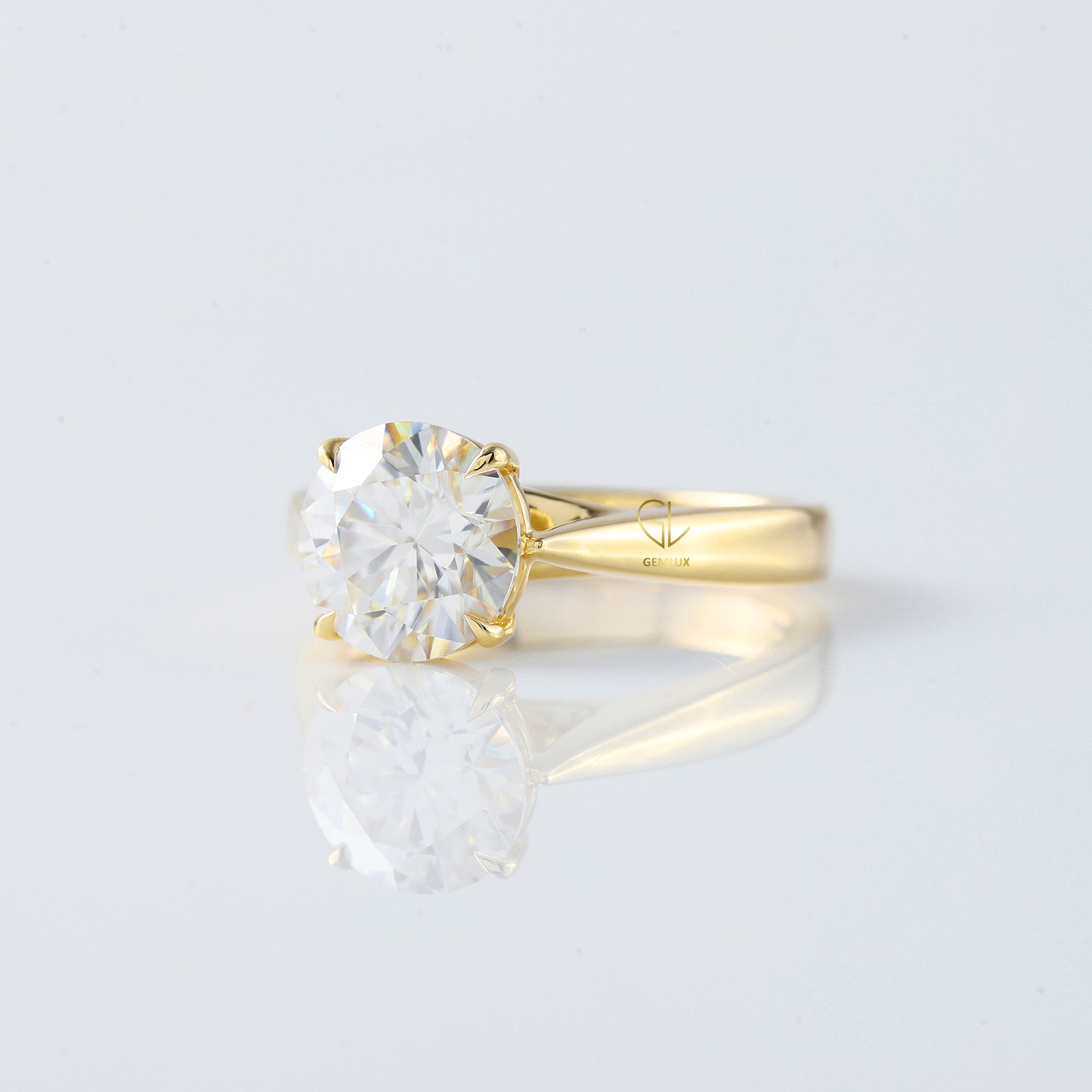 Pinch Style Round Moissanite Solitaire Engagement Ring