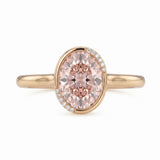 Fancy pink oval lab-grown diamond partial-bezel engagement ring with pavé accents