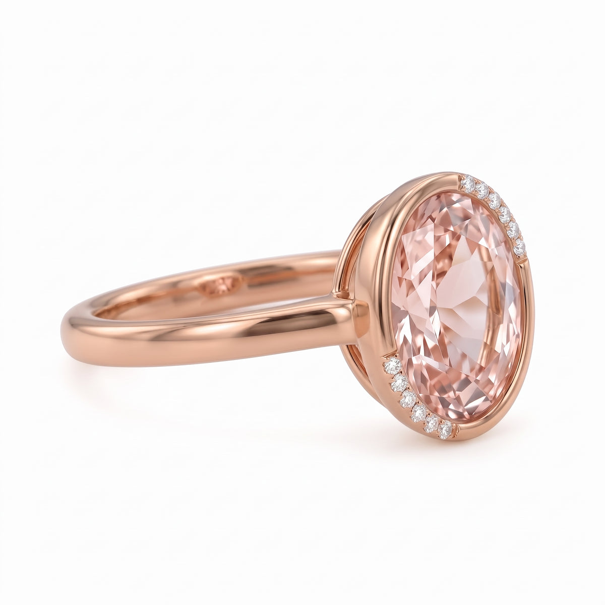 Fancy pink oval lab-grown diamond partial-bezel engagement ring with pavé accents