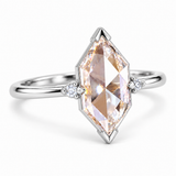 Marquise-cut lab-grown diamond engagement ring with two round side diamonds, V-shaped tip protection and a polished white-metal band
