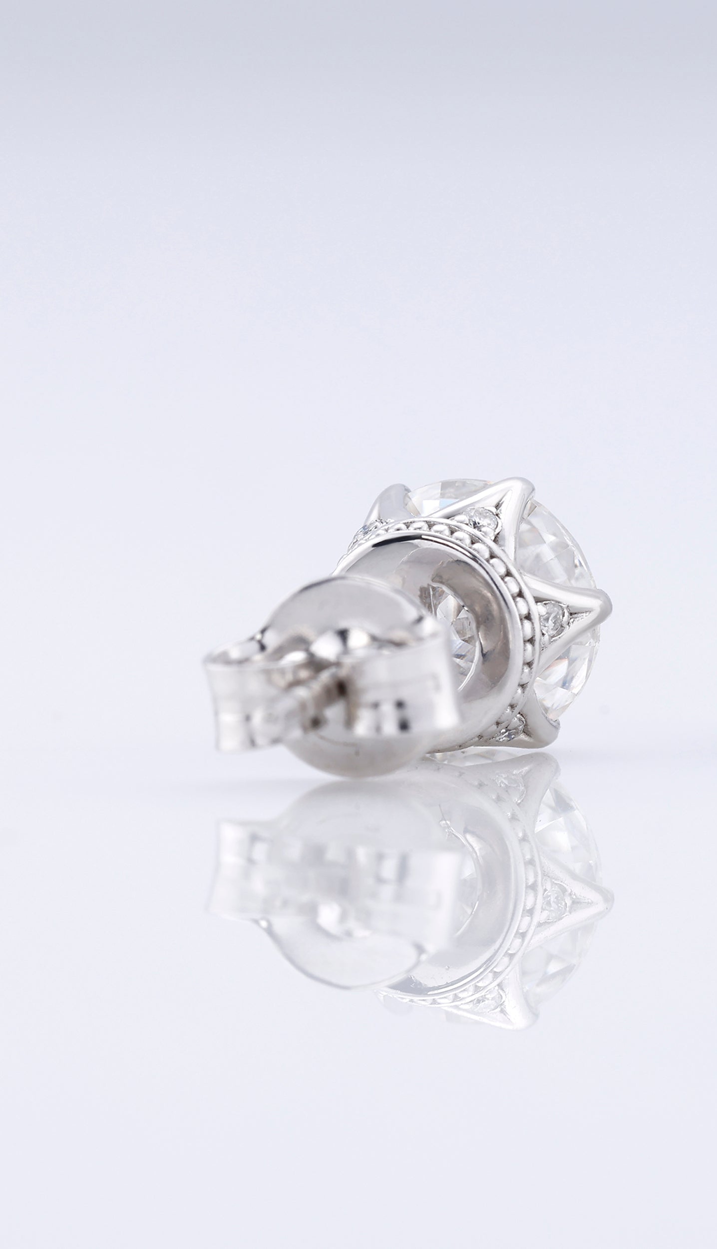 Round Cut Moissanite Stud Earrings - White Gold