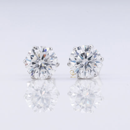 Round Cut Moissanite Stud Earrings - White Gold