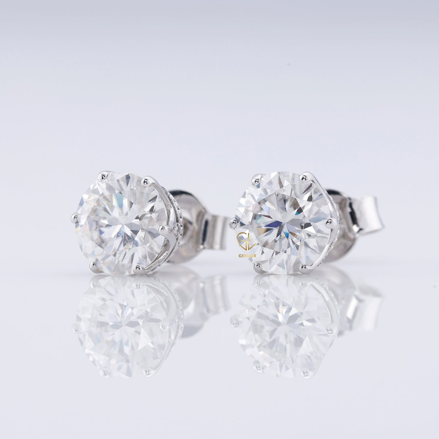 Round Cut Moissanite Stud Earrings - White Gold