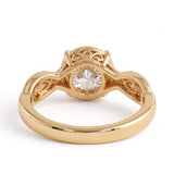 Round lab grown diamond engagement ring with twisted pavé and milgrain band