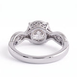Round lab grown diamond engagement ring with twisted pavé and milgrain band