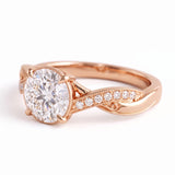 Round lab grown diamond engagement ring with twisted pavé and milgrain band