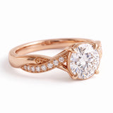 Round lab grown diamond engagement ring with twisted pavé and milgrain band