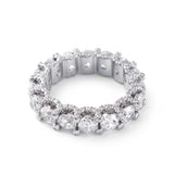 Round cut moissanite full eternity wedding band in white gold with prong set stones