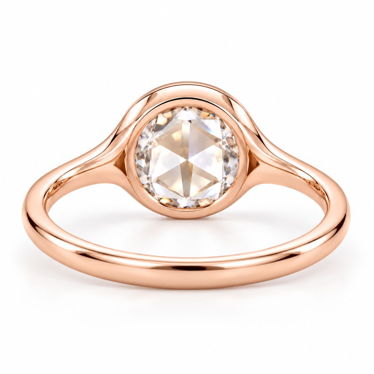 Round rose-cut lab-grown diamond solitaire ring with a smooth bezel setting and sculpted polished white-metal band