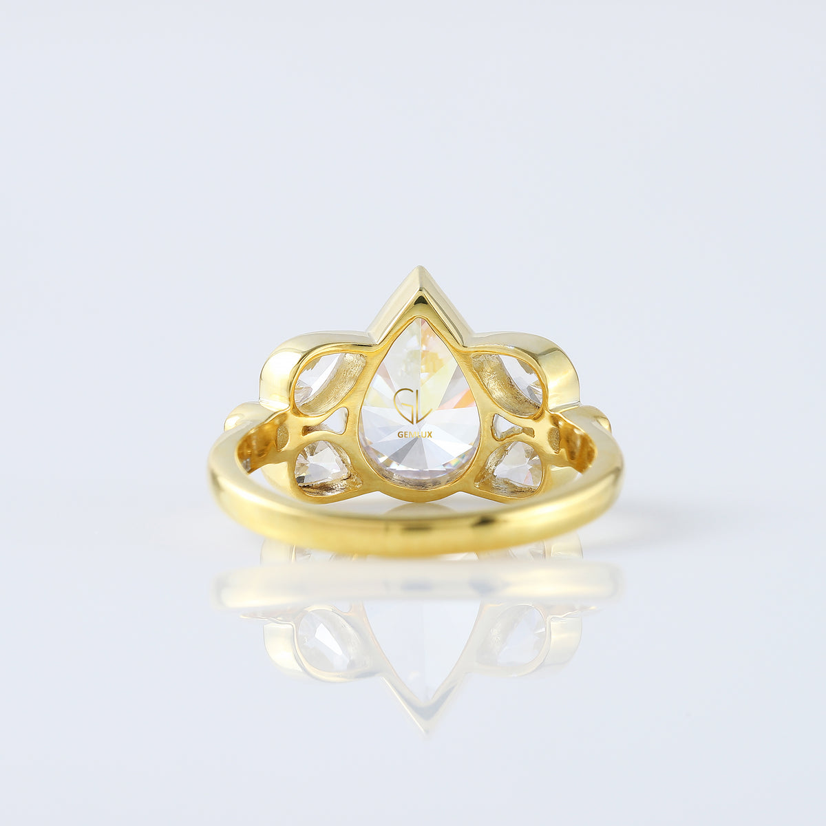 Seven Stone Pear Cut Moissanite Bezel Set Yellow Gold Ring