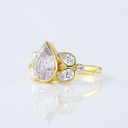Seven Stone Pear Cut Moissanite Bezel Set Yellow Gold Ring