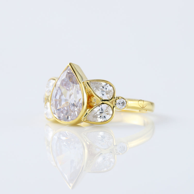 Seven Stone Pear Cut Moissanite Bezel Set Yellow Gold Ring