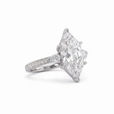 Marquise-cut lab-grown diamond engagement ring with round diamond side clusters and a slim yellow-gold band