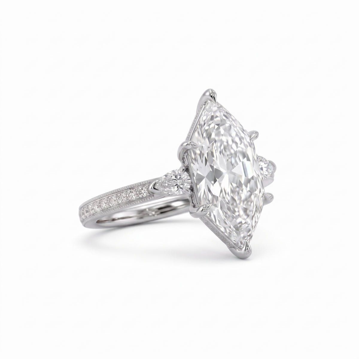 Marquise-cut lab-grown diamond engagement ring with round diamond side clusters and a slim yellow-gold band