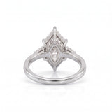 Marquise-cut lab-grown diamond engagement ring with round diamond side clusters and a slim yellow-gold band