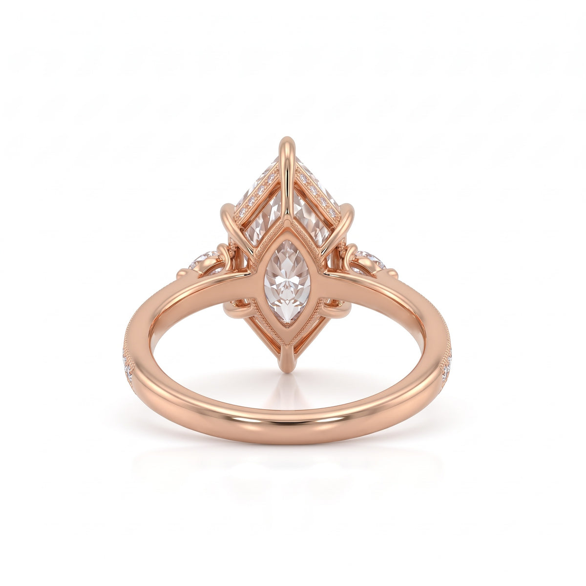 Marquise-cut lab-grown diamond engagement ring with round diamond side clusters and a slim yellow-gold band