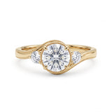 Round-cut lab-grown diamond three-stone bypass engagement ring with curved band