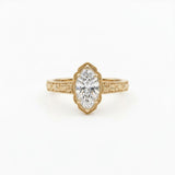 Vintage marquise-cut lab-grown diamond engagement ring with engraved band