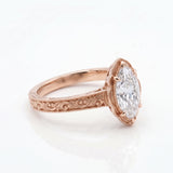 Vintage marquise-cut lab-grown diamond engagement ring with engraved band