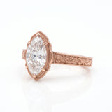 Vintage marquise-cut lab-grown diamond engagement ring with engraved band