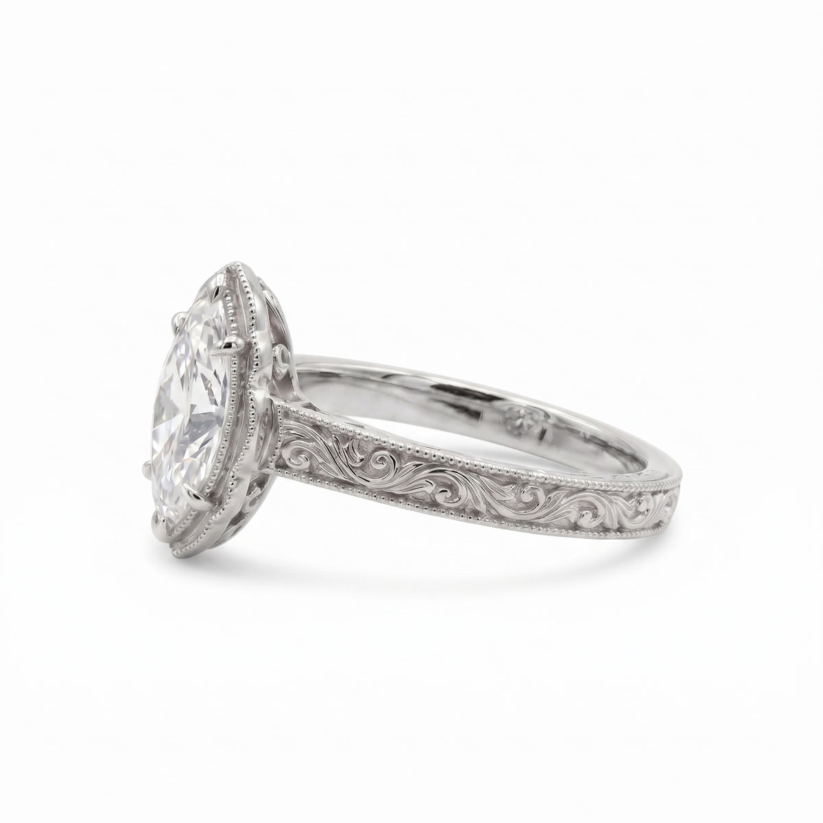 Vintage marquise-cut lab-grown diamond engagement ring with engraved band
