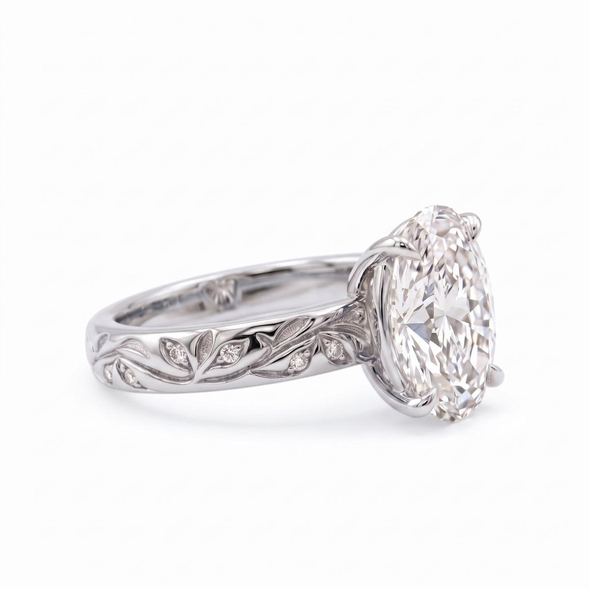 Oval-cut lab-grown diamond botanical engagement ring with leaf and vine band