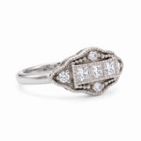 Vintage Art Deco three-stone lab-grown diamond ring with milgrain geometric setting