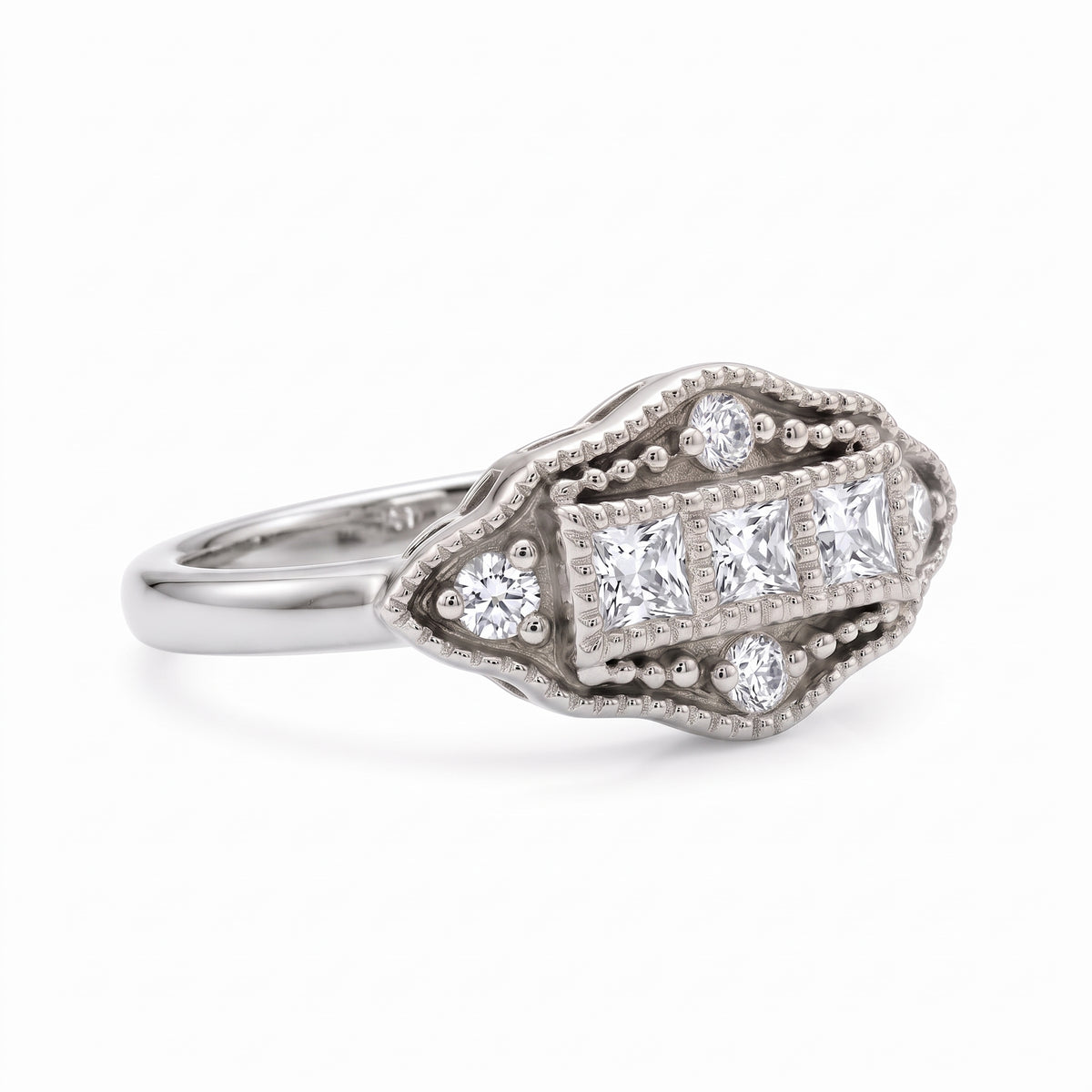 Vintage Art Deco three-stone lab-grown diamond ring with milgrain geometric setting