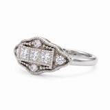 Vintage Art Deco three-stone lab-grown diamond ring with milgrain geometric setting