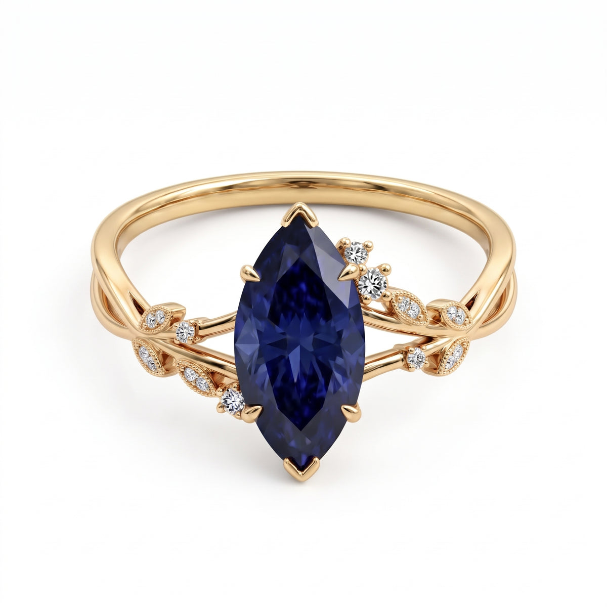 Deep-blue marquise gemstone ring with white-metal split shoulders, sparkling leaf-shaped settings and scattered round accents