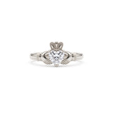 Heart-cut moissanite Irish Claddagh engagement ring with sculpted hands and crown in yellow gold